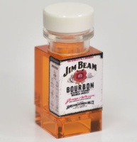 Bottle with print "JB" on 3 sides